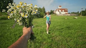 woman running across the field for a bouquet of daisies, field bouquet, happy girl, blue sky, clouds, old houses, woman in sherts, summer - Powered by Shutterstock - Get 15% off with code: PIKWIZARD15