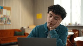 Caucasian tired bored sad upset fatigued man male student guy boy schoolboy pupil internet lesson school university campus cafe studying learning boring problem education laptop computer e-learning - Powered by Shutterstock - Get 15% off with code: PIKWIZARD15