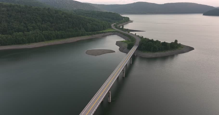 Summer aerial video of the Route 10 bridge over the Cannonsville Reservoir, Delaware County, NY, NYC DEP water supply	