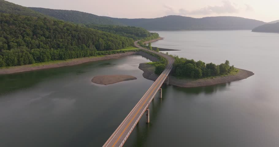 Summer aerial video of the bridge of the Cannonsville Reservoir, Delaware County, NY, NYC DEP water supply	