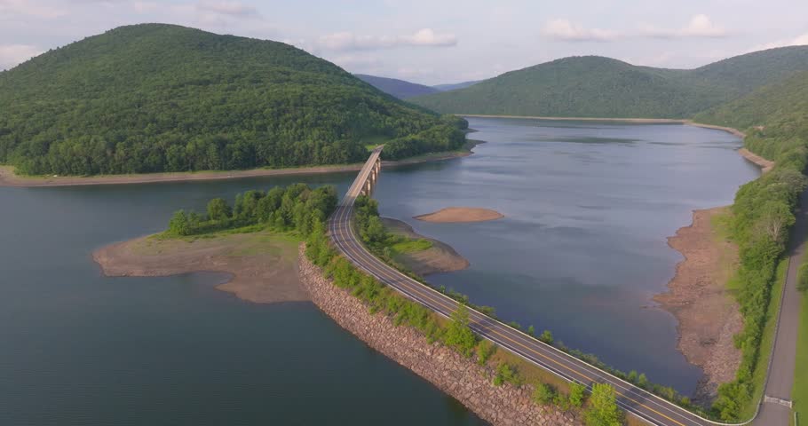 Summer aerial video of the bridge of the Cannonsville Reservoir, Delaware County, NY, NYC DEP water supply	