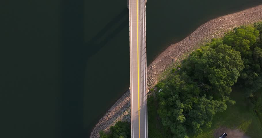 Summer aerial video of the bridge of the Cannonsville Reservoir, Delaware County, NY, NYC DEP water supply	