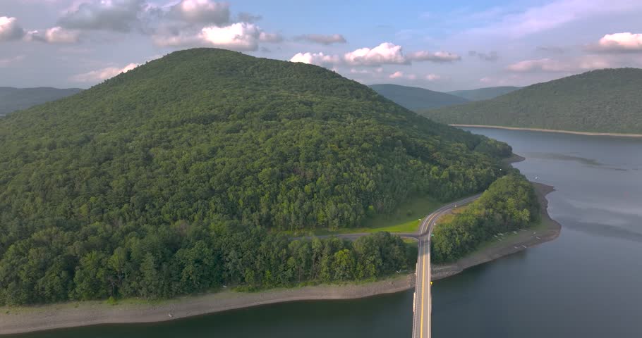 Summer aerial video of the bridge of the Cannonsville Reservoir, Delaware County, NY, NYC DEP water supply	