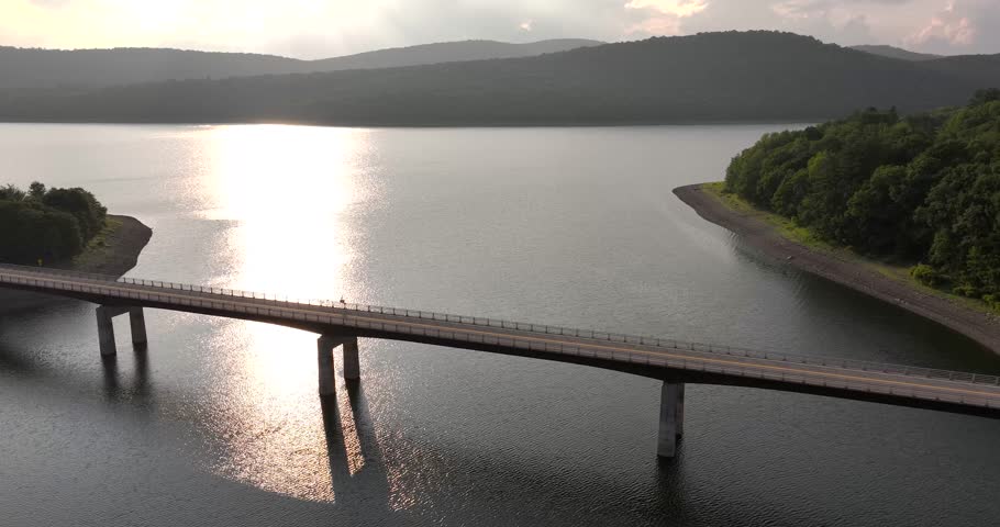Summer aerial video of the bridge of the Cannonsville Reservoir, Delaware County, NY, NYC DEP water supply	