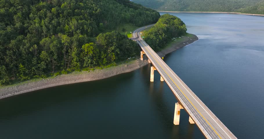 Summer aerial video of the bridge of the Cannonsville Reservoir, Delaware County, NY, NYC DEP water supply	