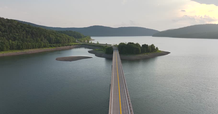 Summer aerial video of the bridge of the Cannonsville Reservoir, Delaware County, NY, NYC DEP water supply	