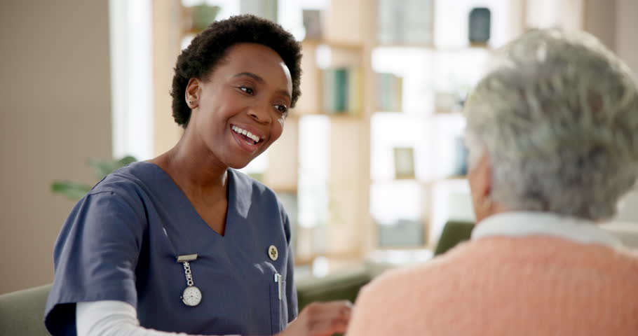 Support, caregiver and senior woman with communication for helping hand, medical advice and rehabilitation healing . Elderly patient, nurse and discussion for healthcare, trust or consulting at house