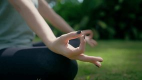 Young Woman Meditating in Relaxing Summer Nature of Yoga Retreat. Sport Lifestyle of Instructor Exercising Healthy Body and Mind at Yogi Training. Fitness Leisure and Female Health of Beautiful Person - Powered by Shutterstock - Get 15% off with code: PIKWIZARD15