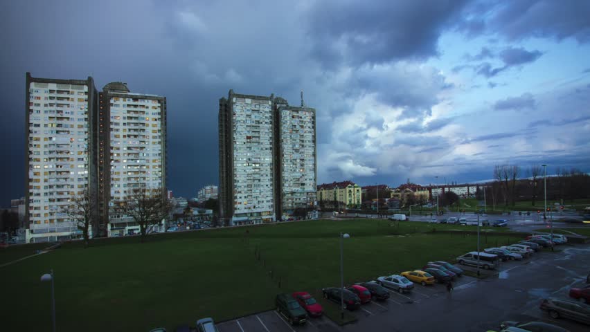 City life and clouds Cloudy Sky in Sunset time lapse