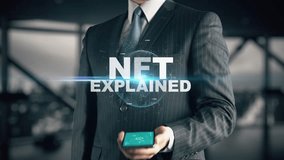 Businessman with NFT Explained hologram concept - Powered by Shutterstock - Get 15% off with code: PIKWIZARD15