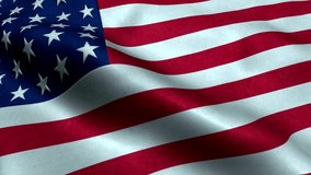 Beautiful Real American flag waving in the wind, in slow motion, with vibrant red white and blue colors lit by the sun, against blue sky for copy space. Slow motion of a US American flag.  - Powered by Shutterstock - Get 15% off with code: PIKWIZARD15