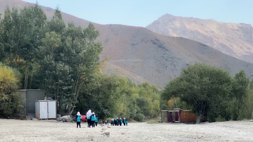 Afghanistan - 17th october, 2023: girls walk wear UNICEF special charity school backpacks. UNICEF 2024 humanitarian appeal. UNICEF in Afghanistan helps cover humanitarian needs of millions of people