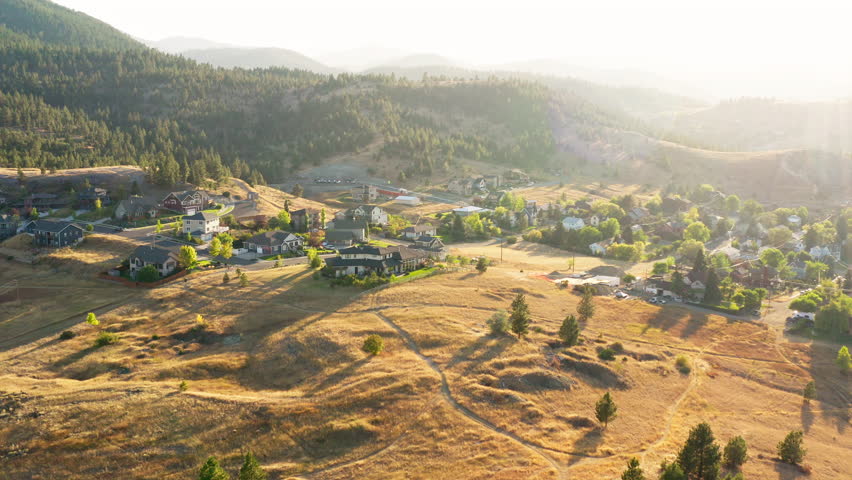 Aerial revealing shot of Helena suburbs on a sunny afternoon