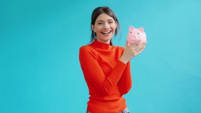 Celebrating Financial Success With a Piggy Bank From Home - Powered by Shutterstock - Get 15% off with code: PIKWIZARD15