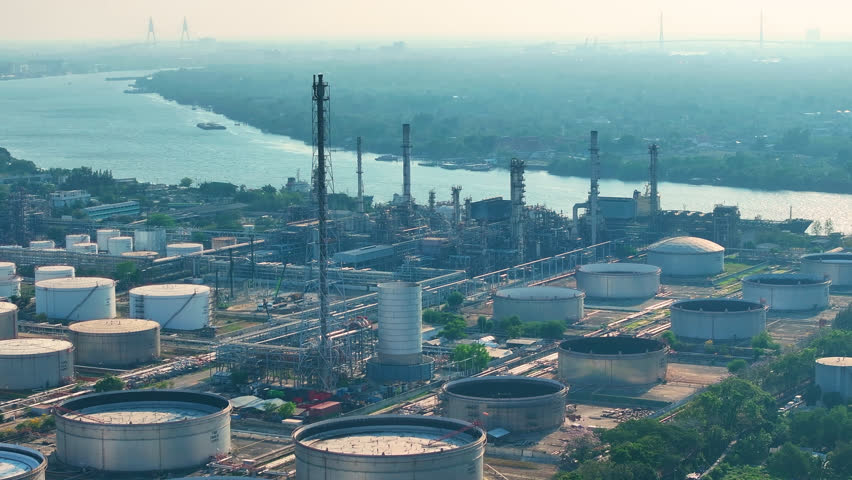 Aerial view oil terminal storage tank, White oil tank storage chemical petroleum. Refinery factory.