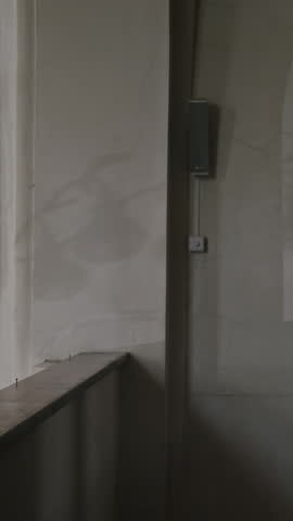 Vertical side view of adult Caucasian nun in religious clothes serving in Catholic Church