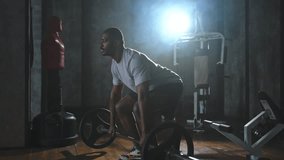Fitness workout healthy lifestyle. African American man bodybuilder weightlifter picking up barbell doing heavy deadlifts in gym Weightlifting workout weight training muscles Man doing sports exercise - Powered by Shutterstock - Get 15% off with code: PIKWIZARD15