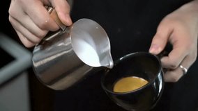 hands making latte art coffee. Ideal morning routine concept with coffee latte. Drinking roasted black coffee in the morning. Latte art in black mug. - Powered by Shutterstock - Get 15% off with code: PIKWIZARD15