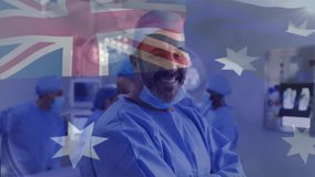 Animation of flag of australia over biracial male surgeon in hospital. Global medicine, healthcare, flags and digital interface concept digitally generated video. - Powered by Shutterstock - Get 15% off with code: PIKWIZARD15