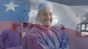 Animation of flag of chile over biracial male surgeon in hospital. Global medicine, healthcare, flags and digital interface concept digitally generated video. - Powered by Shutterstock - Get 15% off with code: PIKWIZARD15