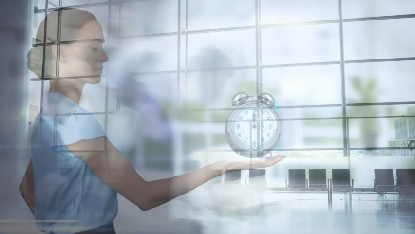Animation of ticking alarm clock over businesspeople in fast motion. Global finance, business, connections, cloud computing and data processing concept digitally generated video. - Powered by Shutterstock - Get 15% off with code: PIKWIZARD15