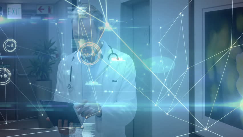 Animation of network of connections with data processing over caucasian male doctor in hospital. Global medicine, healthcare, connections and digital interface concept digitally generated video. - Powered by Shutterstock - Get 15% off with code: PIKWIZARD15