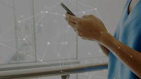 Animation of connections over biracial female doctor using smartphone. Technology, medicine and digital interface concept digitally generated video. - Powered by Shutterstock - Get 15% off with code: PIKWIZARD15