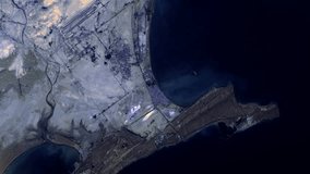 Iran Chabahar bay flying aerial satellite view, sunrise animation based on image by Nasa - Powered by Shutterstock - Get 15% off with code: PIKWIZARD15