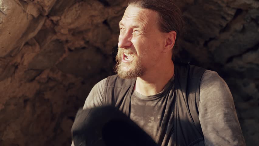 A man in the sun suffers from the heat