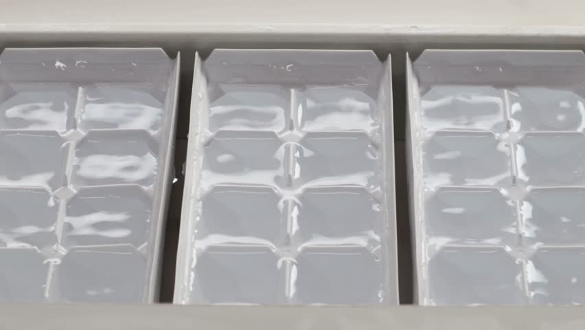 Pour water into the tray before freezing the ice in the freezer