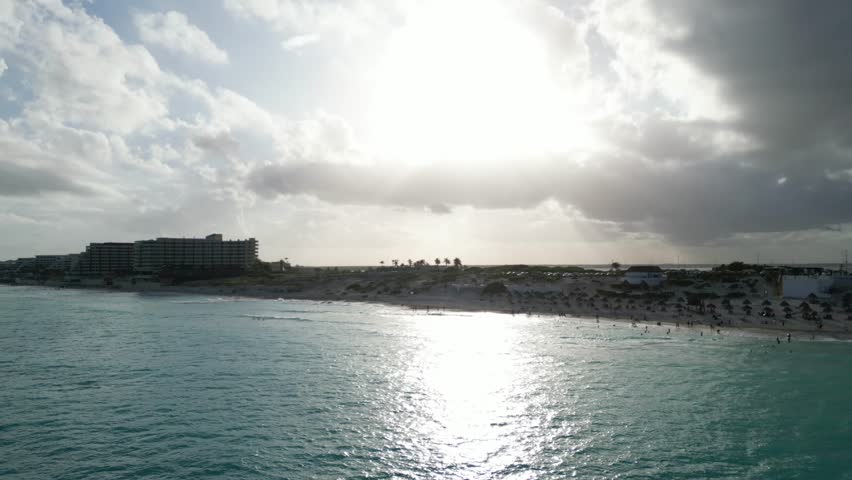 A drone view of a beautiful sea in Cancun, Mexico on a sunny day