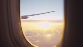 View of beautiful blue sky and sunset with cloudy outside an airplane. Transport of jet engine view outside the window of commercial airplane while floating on the atmosphere sky to destination. - Powered by Shutterstock - Get 15% off with code: PIKWIZARD15