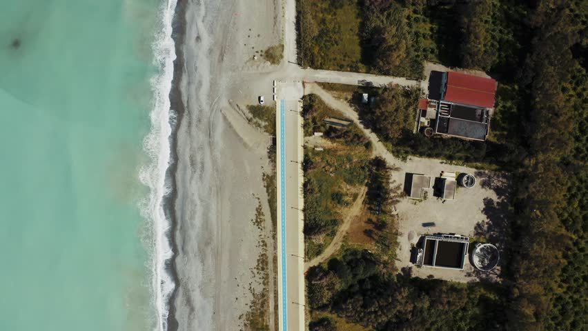 Aerial, Spiaggia di Torrenova Beach, Sicily. Graded and stabilized version.