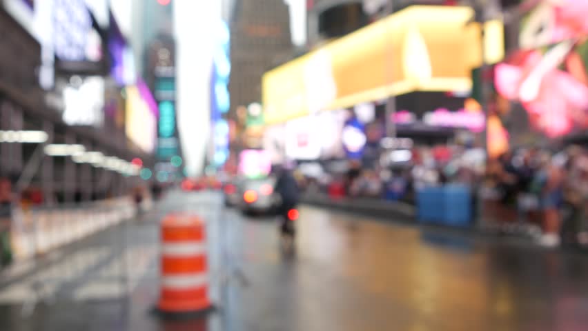 New York City Times Square, Manhattan Midtown Broadway street, USA. American NYC yellow taxi cab, urban road traffic. People. Advertising signs, commercial ads, illuminated billboard screens glowing.