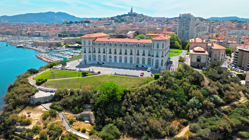 Aerial View Of Palais du Pharo Overlooking Seafront In Marseille, France. French Cultural landmark, conference centre with gardens overlooking the seafront.
