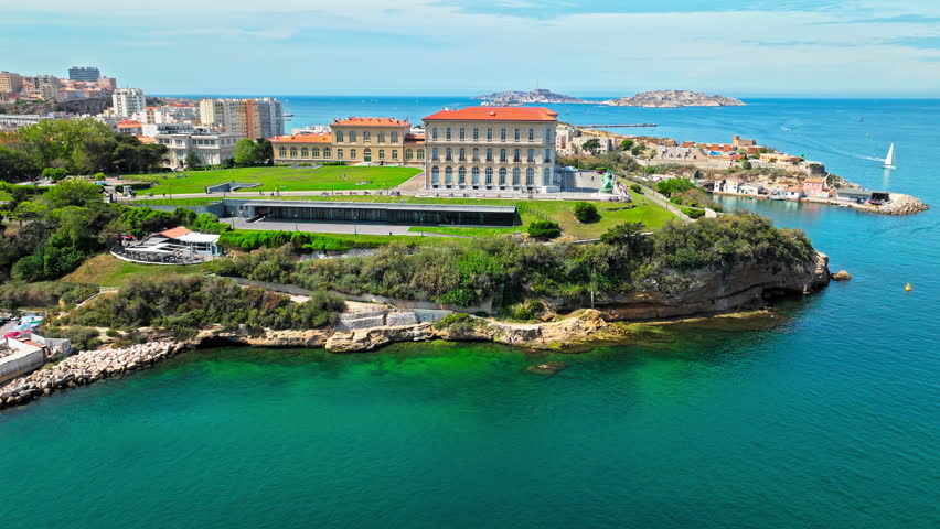Aerial View Of Palais du Pharo Overlooking Seafront In Marseille, France. French Cultural landmark, conference centre with gardens overlooking the seafront.