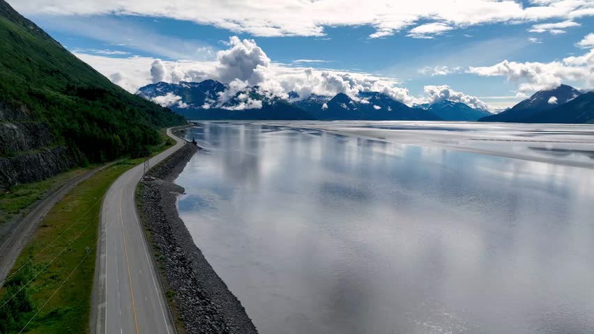 aerial of roadway and turnagain arm in alaska