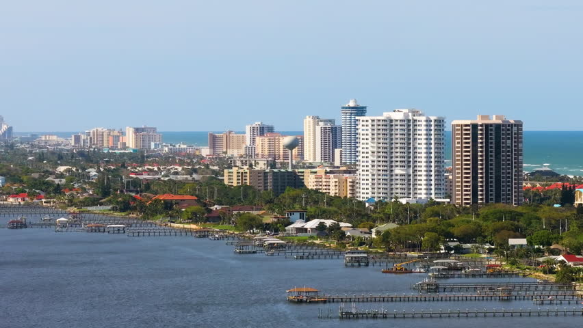 Aerial view of waterfront houses in Daytona Beach city, Florida. Coastal housing development in the USA
