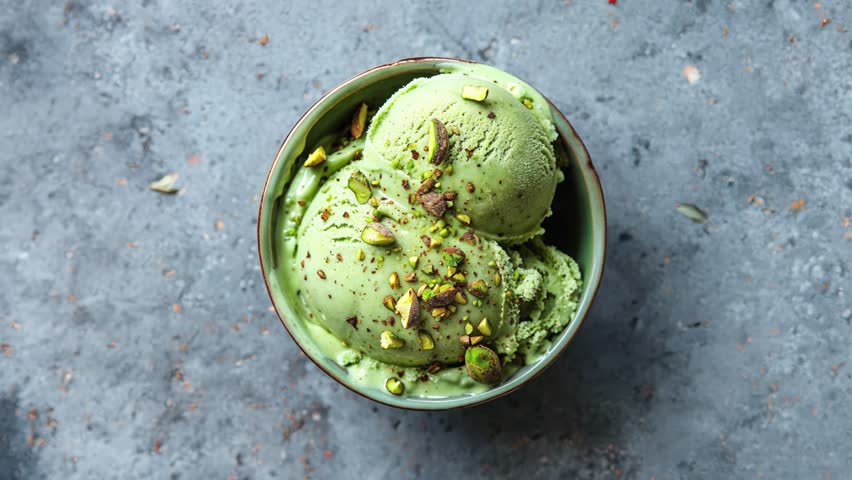 Green Pistachio Ice Cream In A Bowl