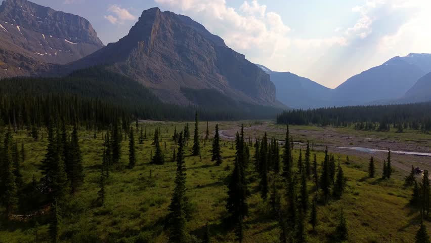 Ruby Falls Waterfall and Gorgeous Rocky Mountain Range outside Jasper National Park in Alberta Canada