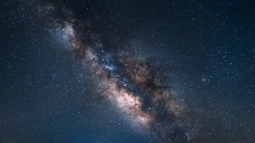 A timelapse of the Milky Way galaxy shining in the starry sky