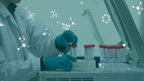 Animation of molecules over caucasian male scientist working in lab. Global medicine, science and digital interface concept digitally generated video. - Powered by Shutterstock - Get 15% off with code: PIKWIZARD15