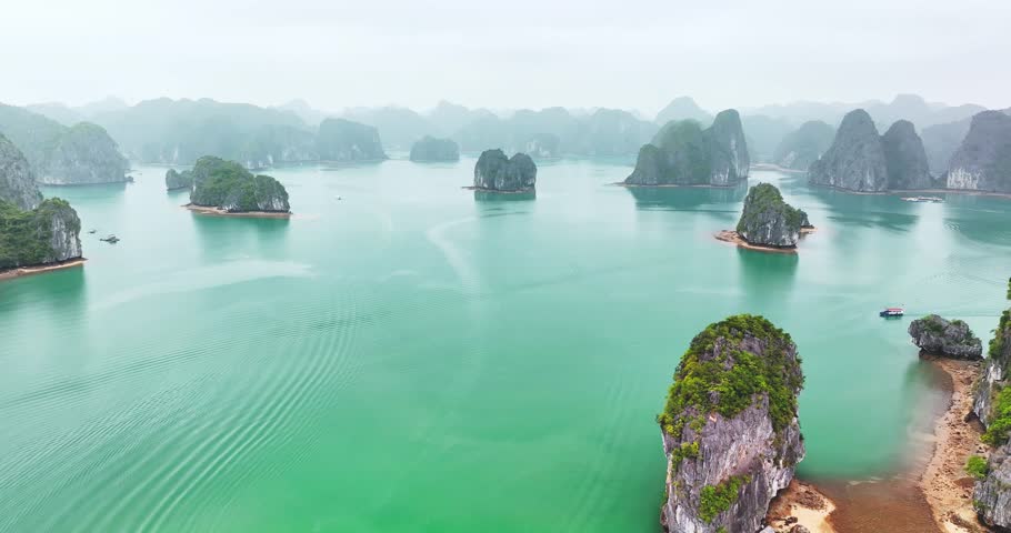 Rock island in Lan Ha bay, Vietnam, Southeast Asia. UNESCO World Heritage Site. Popular landmark, famous destination of Vietnam. Near Halong bay 