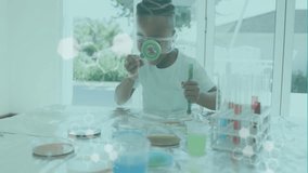 Animation of data processing and chemical formula over african american boy doing experiments. Global science, medicine, computing and digital interface concept digitally generated video. - Powered by Shutterstock - Get 15% off with code: PIKWIZARD15