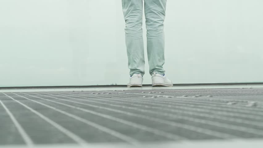 A mans legs walk away from the abyss on a foggy day. Inspiration and hope concept. Pure thoughts and strength of spirit. Pull yourself together and find yourself. Make plans for the future