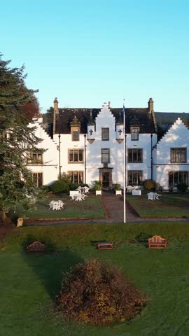 castle hotel fairytale early morning sunshine autumn estate luxury backward aerial