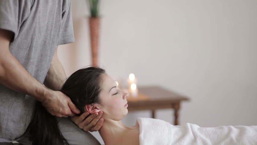 Neck massage in spa. Alignment of the cervical vertebrae
