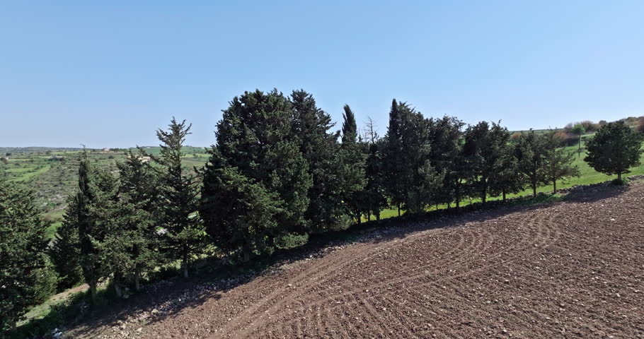 Aerial view of a road in the mountains of Cyprus. Countryside travel by car on the island of tourism. High quality 4k footage