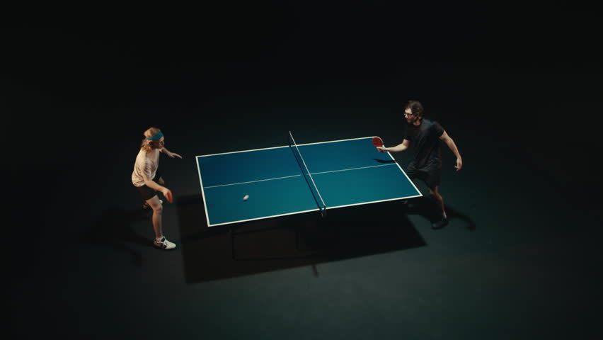 Table Tennis Players in a Match - Powered by Shutterstock - Get 15% off with code: PIKWIZARD15