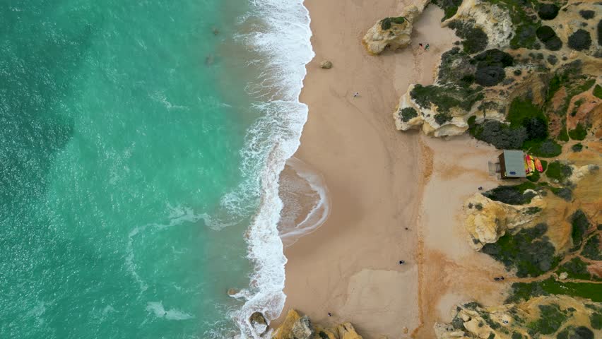 Praia de Sao Rafael, Algarve is a stunning little beach. The clear, shallow waters, silky, golden sand and rock formations makes it a popular gem.
